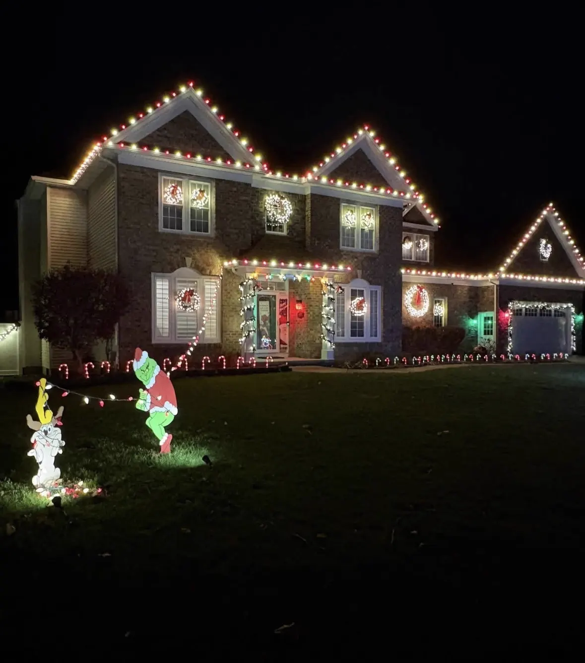 Professional exterior lighting install at night